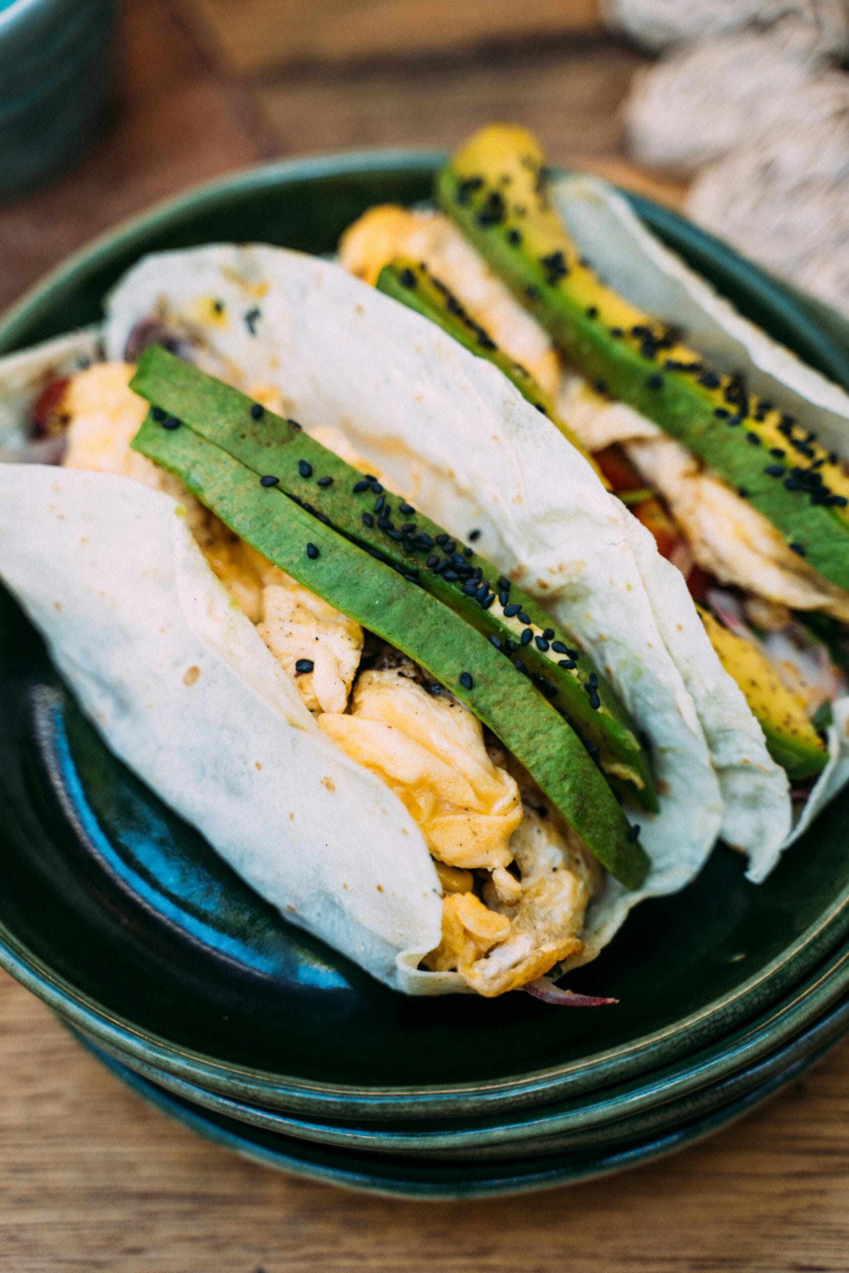 A whole-grain wrap filled with avocado and eggs, ideal for a quick, nutrient-packed breakfast