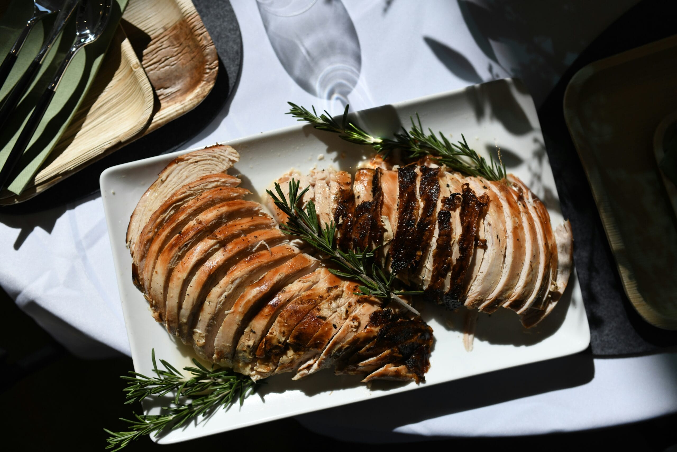 Herb-roasted turkey breast, lean and high-protein, perfect for healthy holiday recipes.
