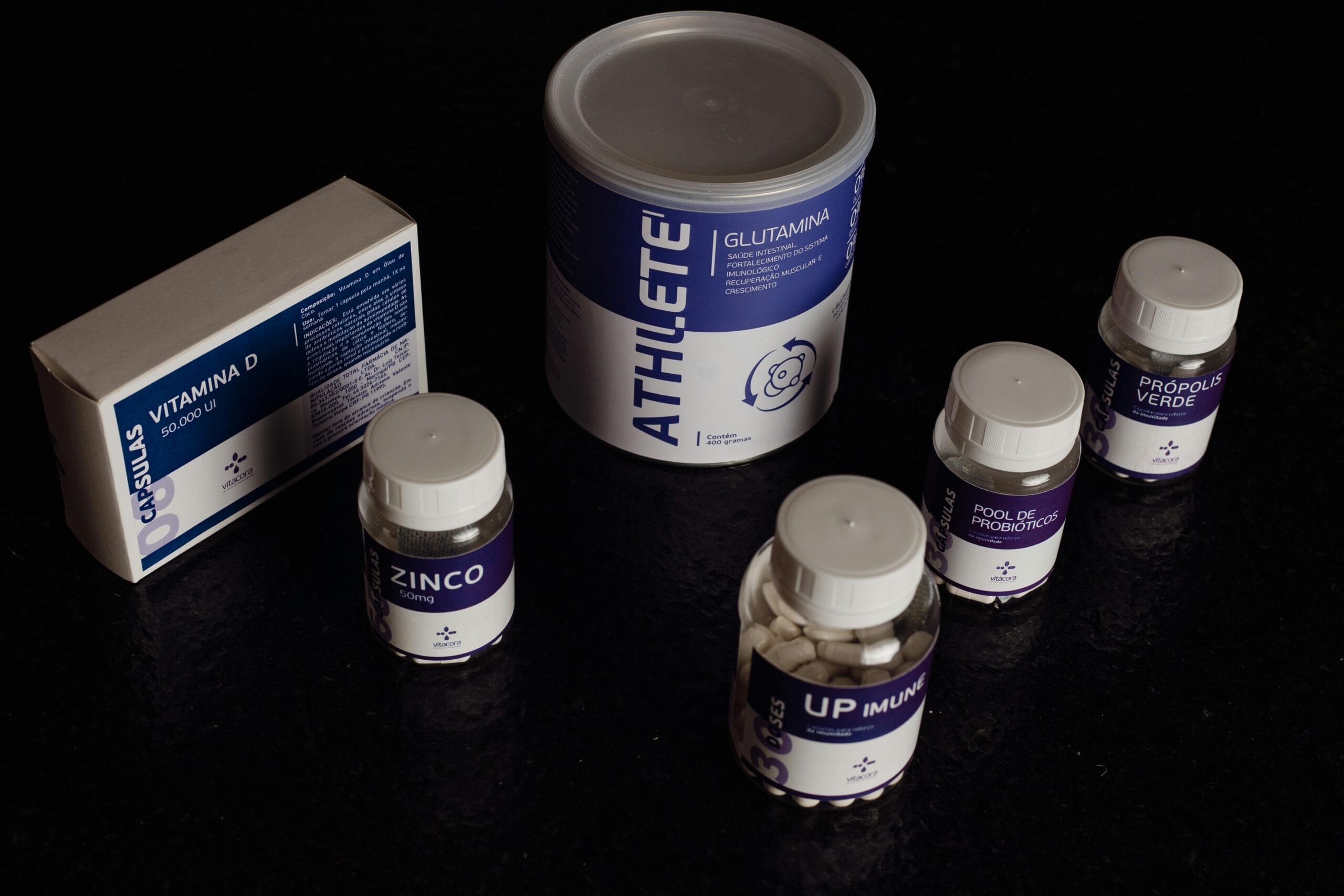 Assorted supplements bottles including glutamine.
