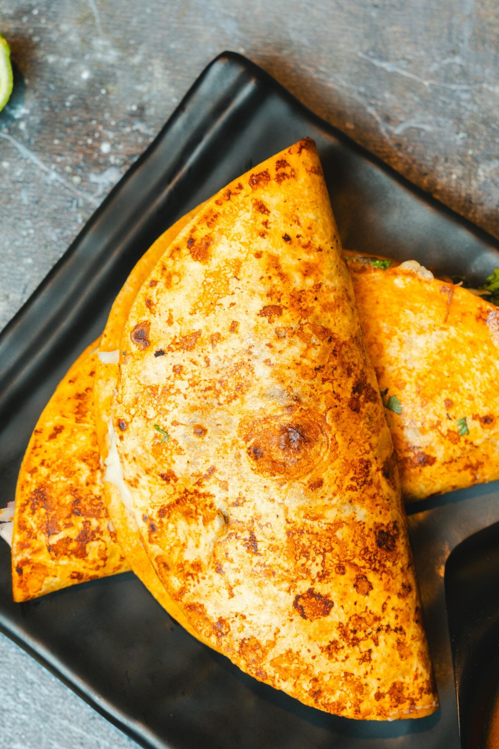 Corn tacos filled with roasted sweet potatoes and black beans