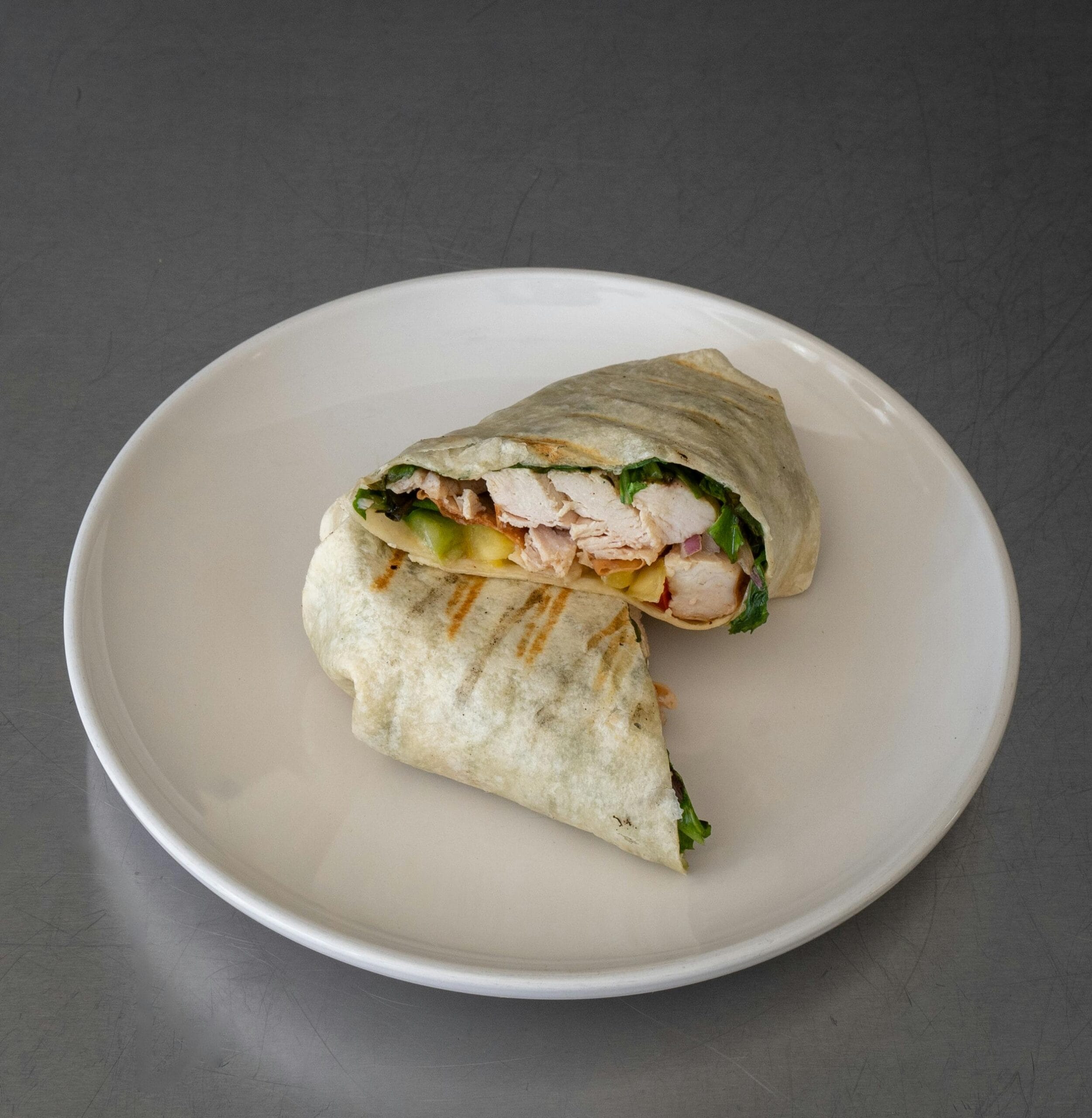 Whole wheat wrap filled with grilled chicken, bell peppers, and lettuce—one of the best healthy lunch recipes
