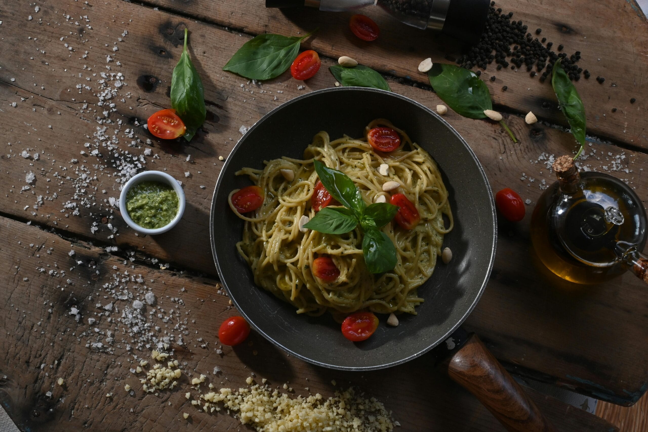 Zucchini noodles with pesto sauce and cherry tomatoes