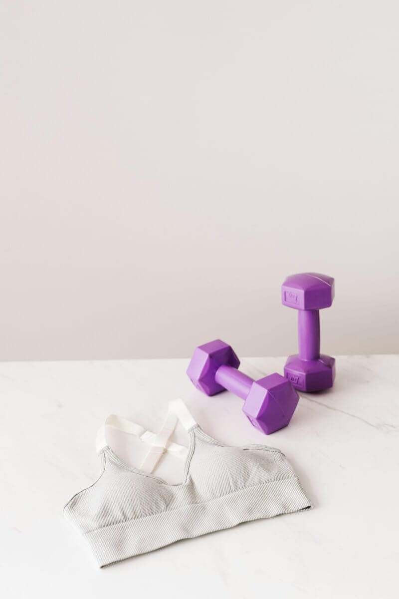 workout clothes and dumbbells prepared in advance for training