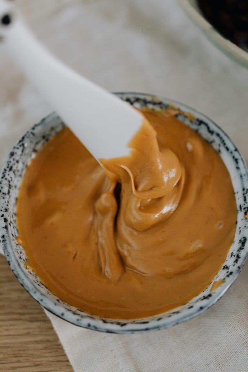 Bowl of peanut butter used for making peanut butter protein energy balls